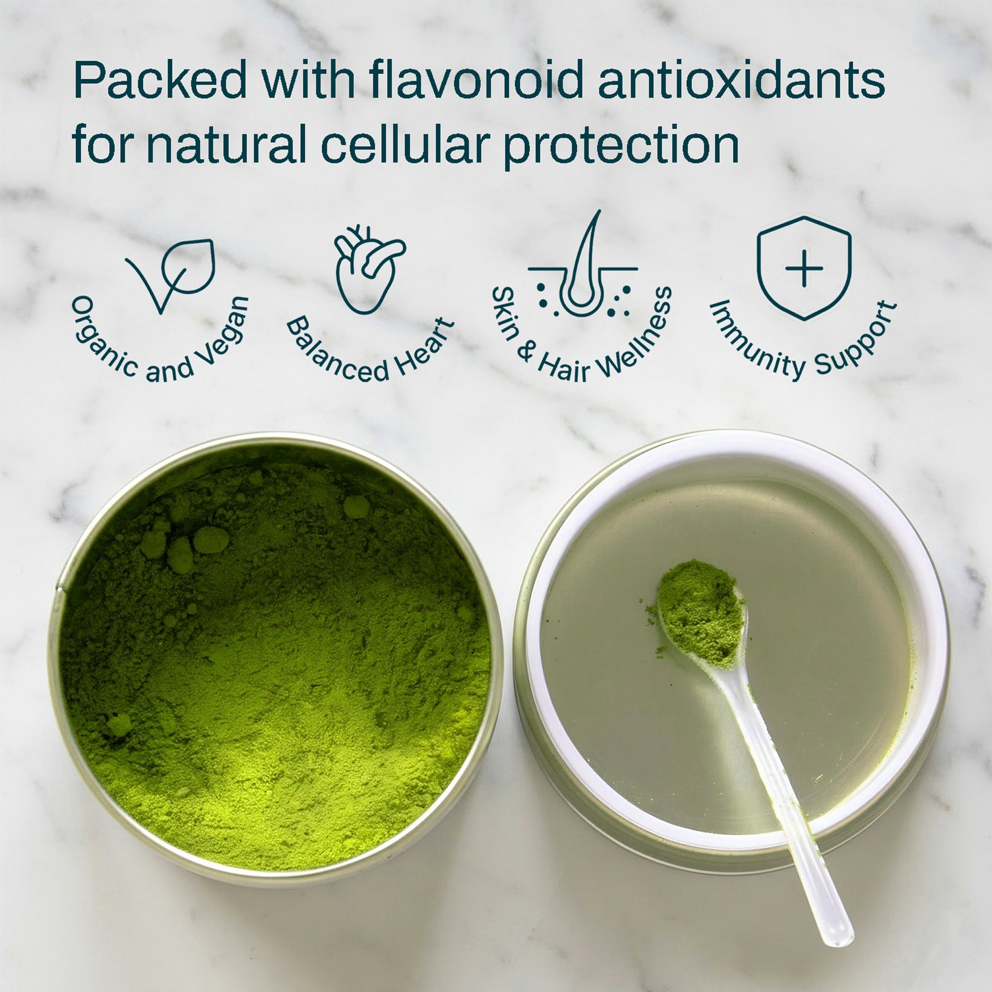 Green powder in a container with a spoonful on a marble background, highlighting health benefits.